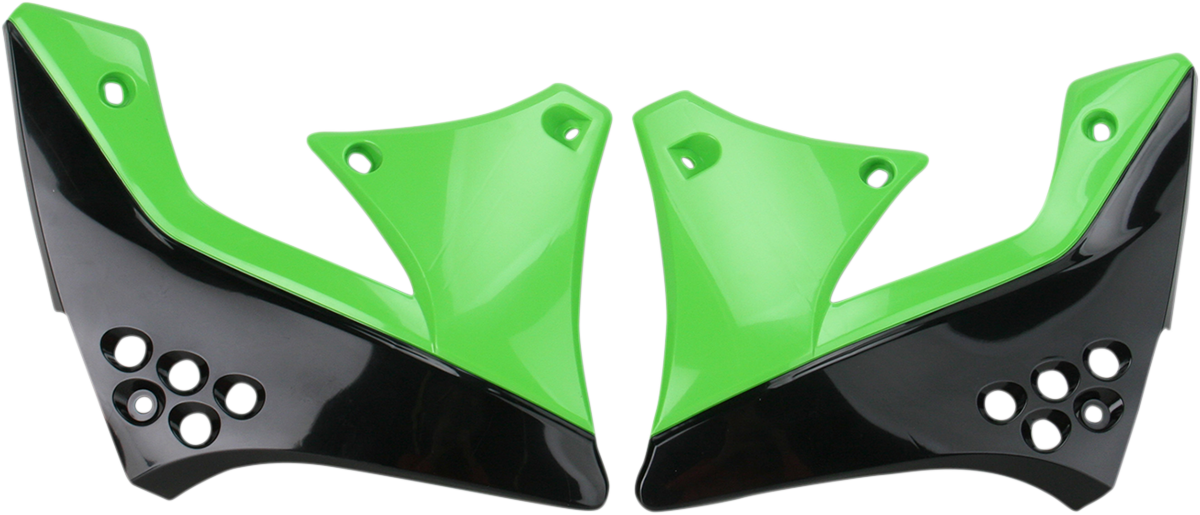 Acerbis black and green radiator shrouds for motorcycle, displayed on a body part with vent details and branding accents.