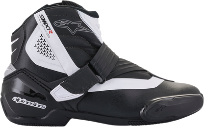 Alpinestars SMX-1 R v2 motorcycle racing boots in black and white, US 8 / EU 42, with protective design and branding details.