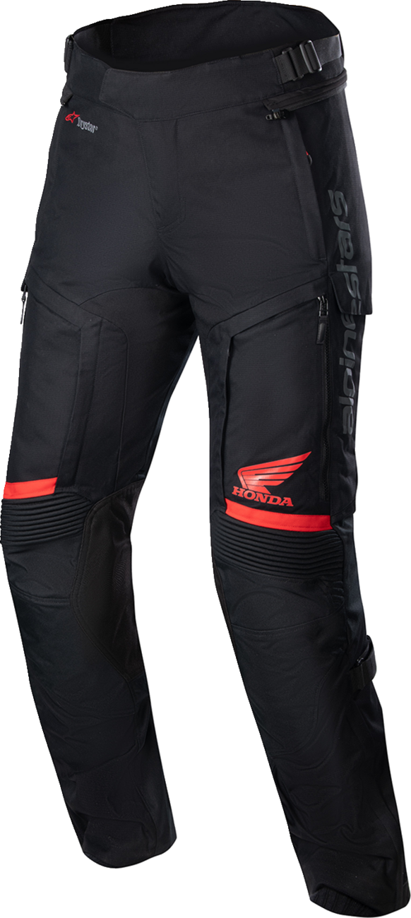 Black and red Alpinestars Honda Bogotá Pro Drystar® motorcycle pants in medium size, featuring protective armor and durable fabric.