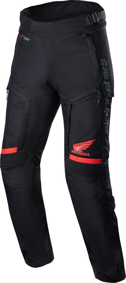 Black and red Alpinestars Honda Bogotá Pro Drystar® motorcycle pants in medium size, featuring protective armor and durable fabric.