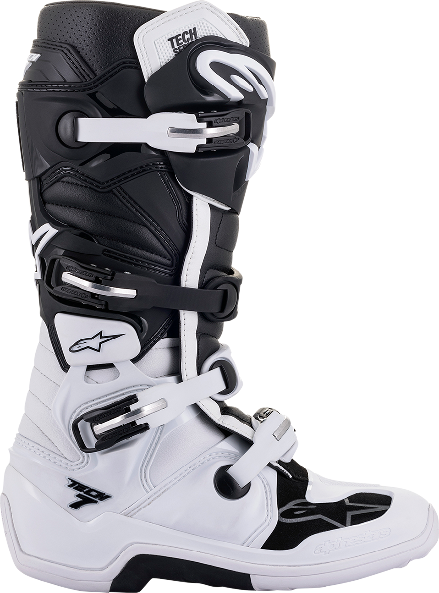 Alpinestars Tech 7 motocross boots in white and black, US size 10, featuring ankle protection and durable design.