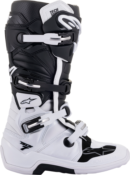 Alpinestars Tech 7 motocross boots in white and black, US size 10, featuring ankle protection and durable design.