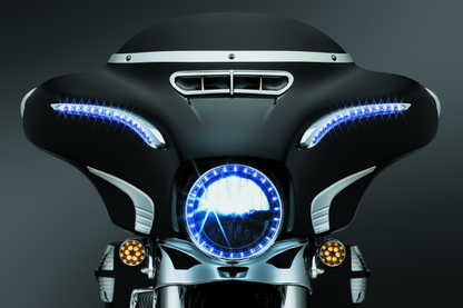 Chrome Kuryakyn Smooth Windshield Trim for Harley-Davidson Touring Models, showcasing sleek, polished motorcycle windshield accessory.