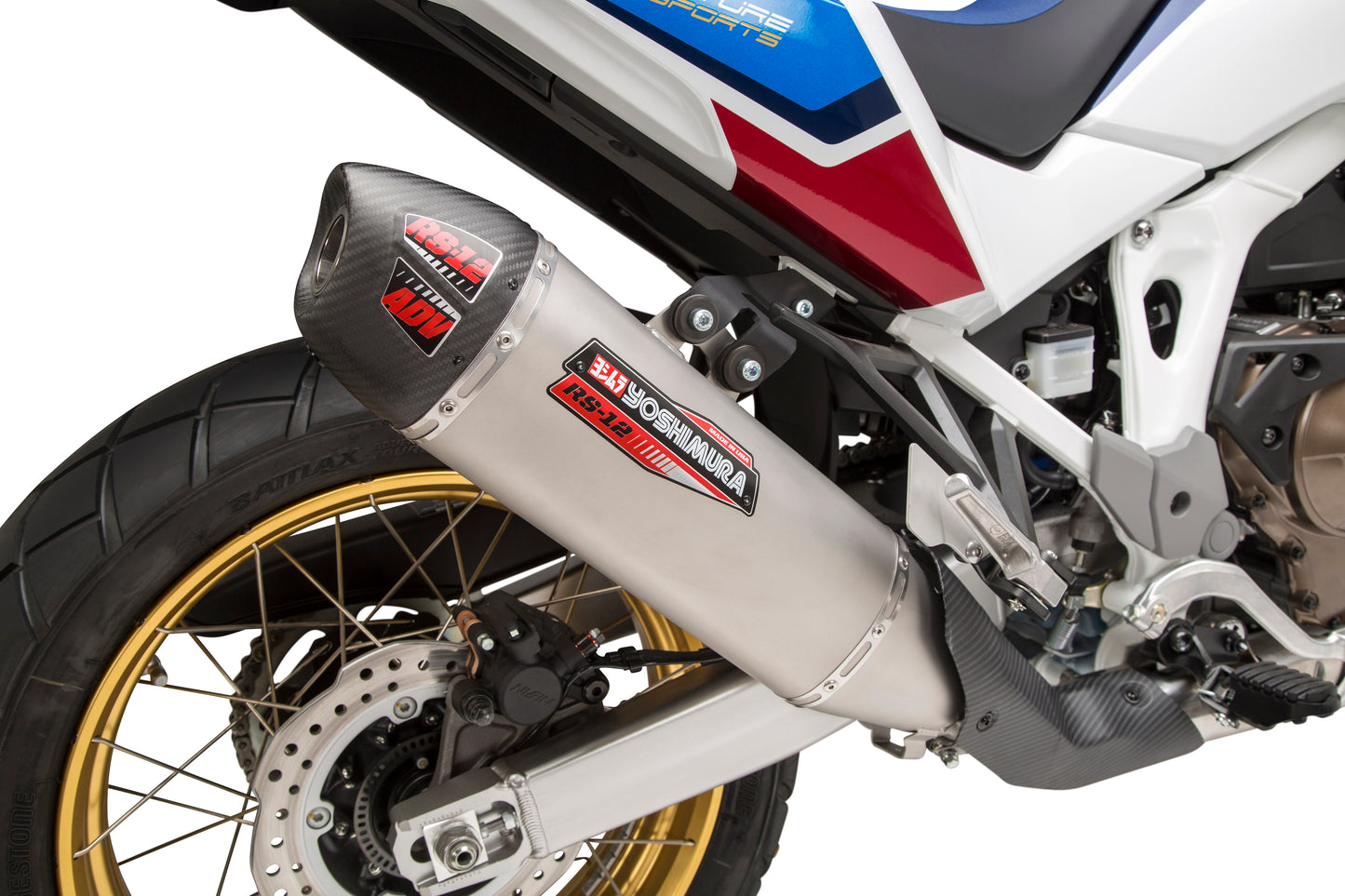 YOSHIMURA RS-12 slip-on exhaust for off-road vehicles, featuring a sleek metal muffler and installation components.