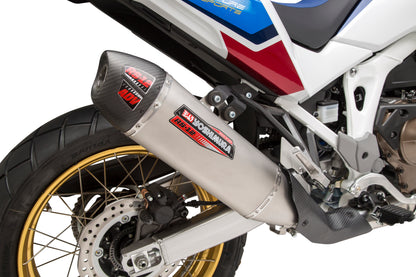 YOSHIMURA RS-12 slip-on exhaust for off-road vehicles, featuring a sleek metal muffler and installation components.