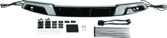 Kuryakyn Tracer windshield trim in black for Harley Davidson FLH models, shown installed on motorcycle with sleek design