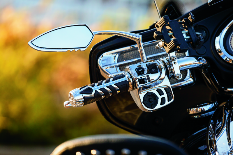 Chrome Kuryakyn raised mirror adaptors for metric motorcycle models, designed to improve mirror positioning and visibility.