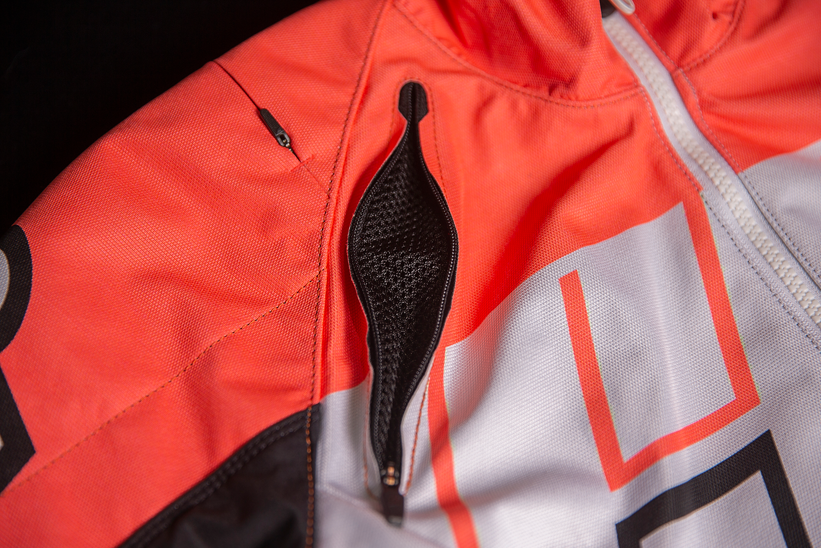 ICON Women's Airform Retro Jacket in coral, XS, featuring a vintage-inspired design with a lightweight, stylish fit.