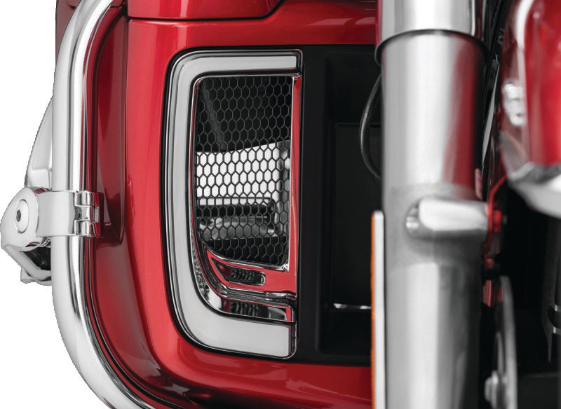 Kuryakyn Tracer LED fairing lower grills with white running lights and amber flash on air-cooled motorcycle model