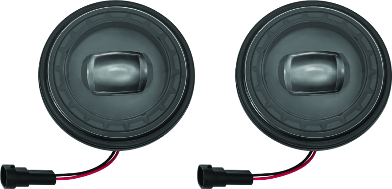 Kuryakyn Orbit 4-1/2 inch passing lamps with black finish mounted on motorcycle handlebars.