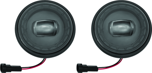 Kuryakyn Orbit 4-1/2 inch passing lamps with black finish mounted on motorcycle handlebars.
