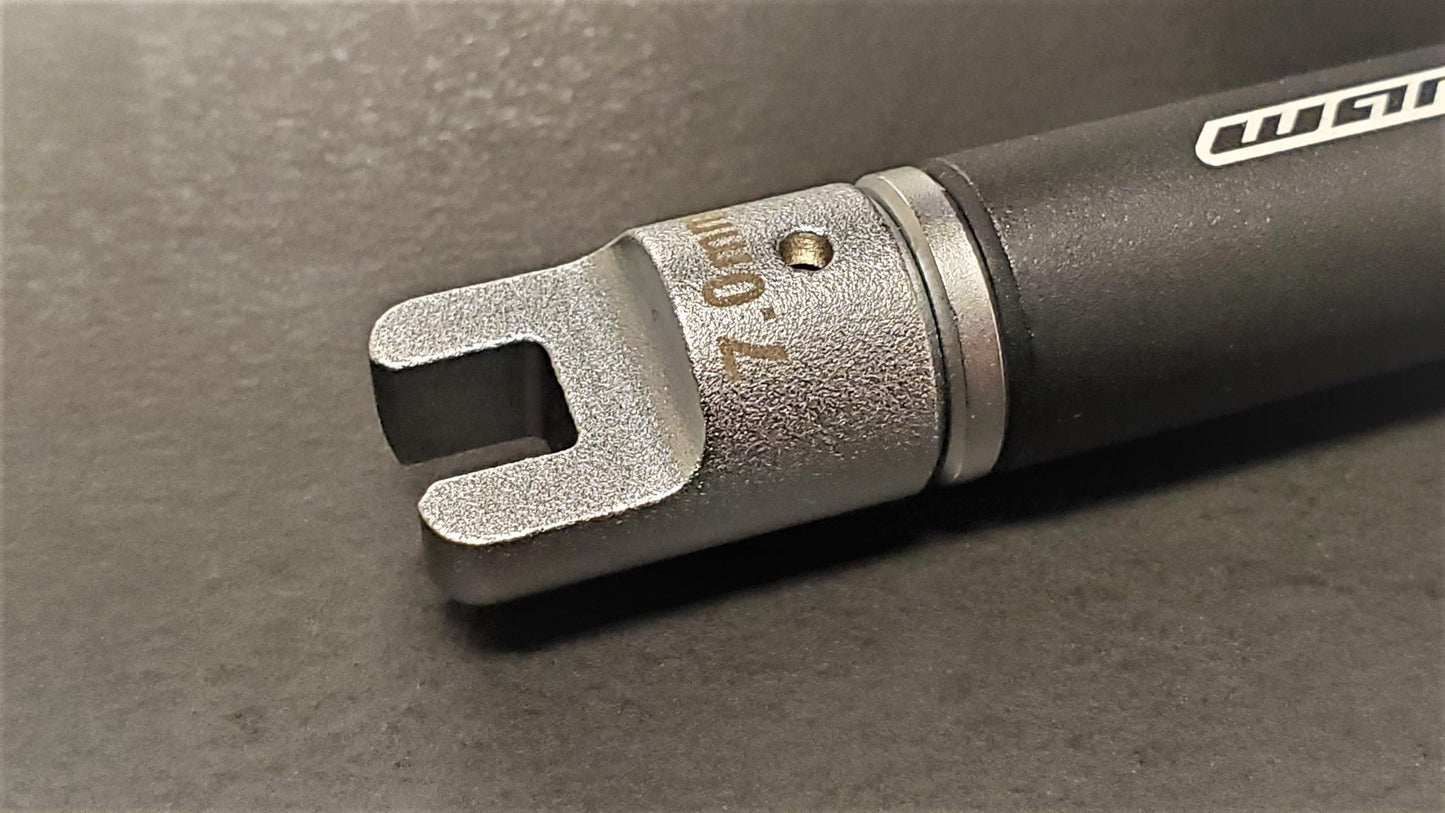 Warp9Racing 7.0mm spoke wrench tip for bike wheel spoke adjustments, shown in close-up on a black background.