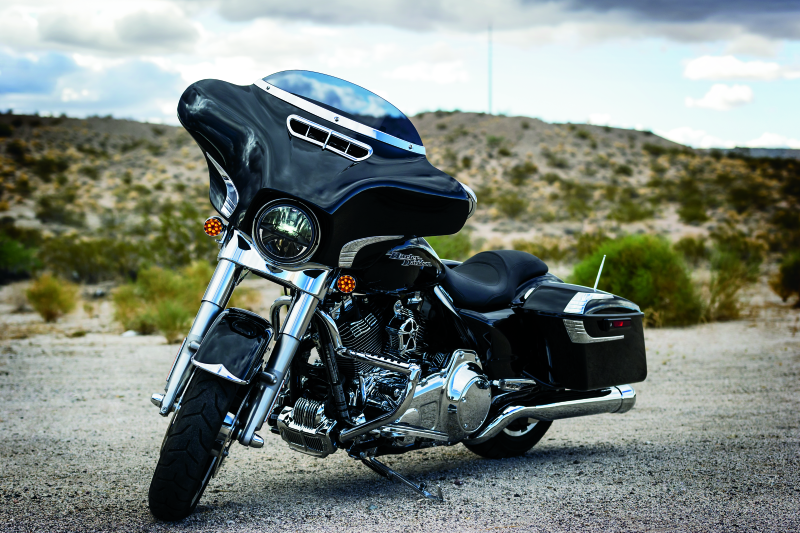Kuryakyn chrome Smooth Windshield Trim for Harley-Davidson Touring models, part #1387, featuring sleek design and polished finish.