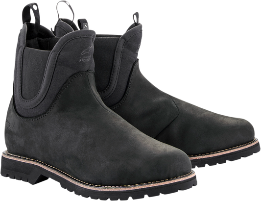 Alpinestars Turnstone motorcycle boots in black, US size 10, featuring sturdy design and protective features.