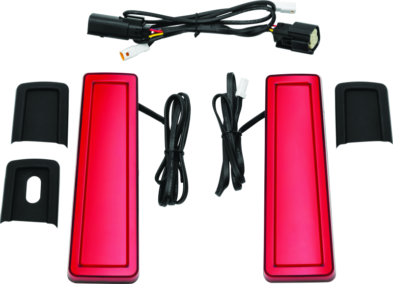 Kuryakyn Tracer Filler Panel Lights with red lens on custom LED saddlebag accents for motorcycle.