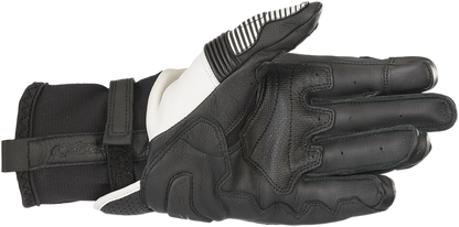Alpinestars GPX V2 motorcycle gloves in black and white, size 3XL, featuring protective knuckles and adjustable wrist straps.