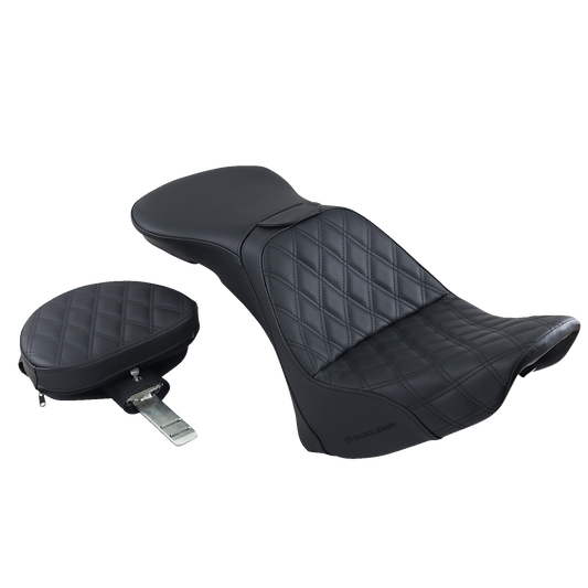 Black Saddlemens Explorer Seat with backrest and lattice stitching, designed for FLSTN motorcycles, by Bill's Exhausts.