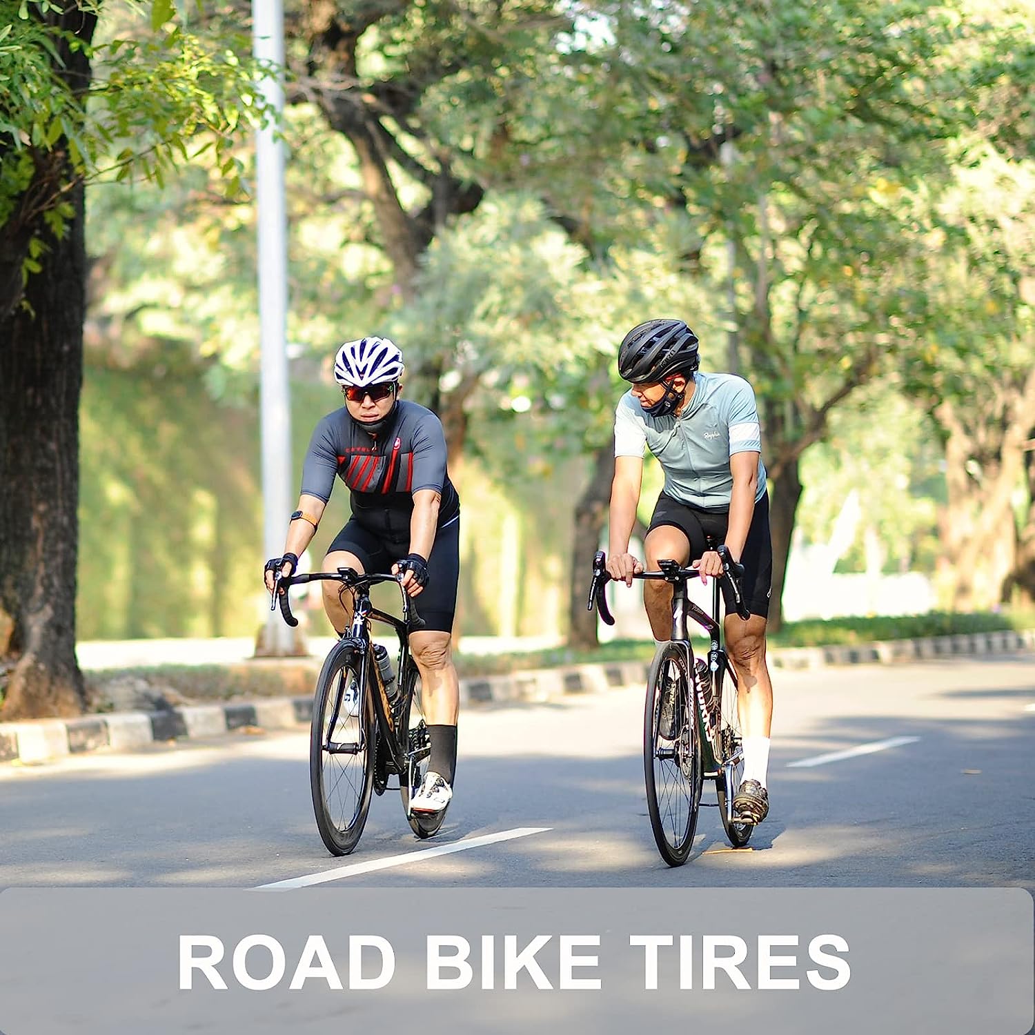 Two Hycline road bike tires, 700×25C / 28C / 35C, mounted on a bicycle wheel, displaying tread pattern and sidewall details.