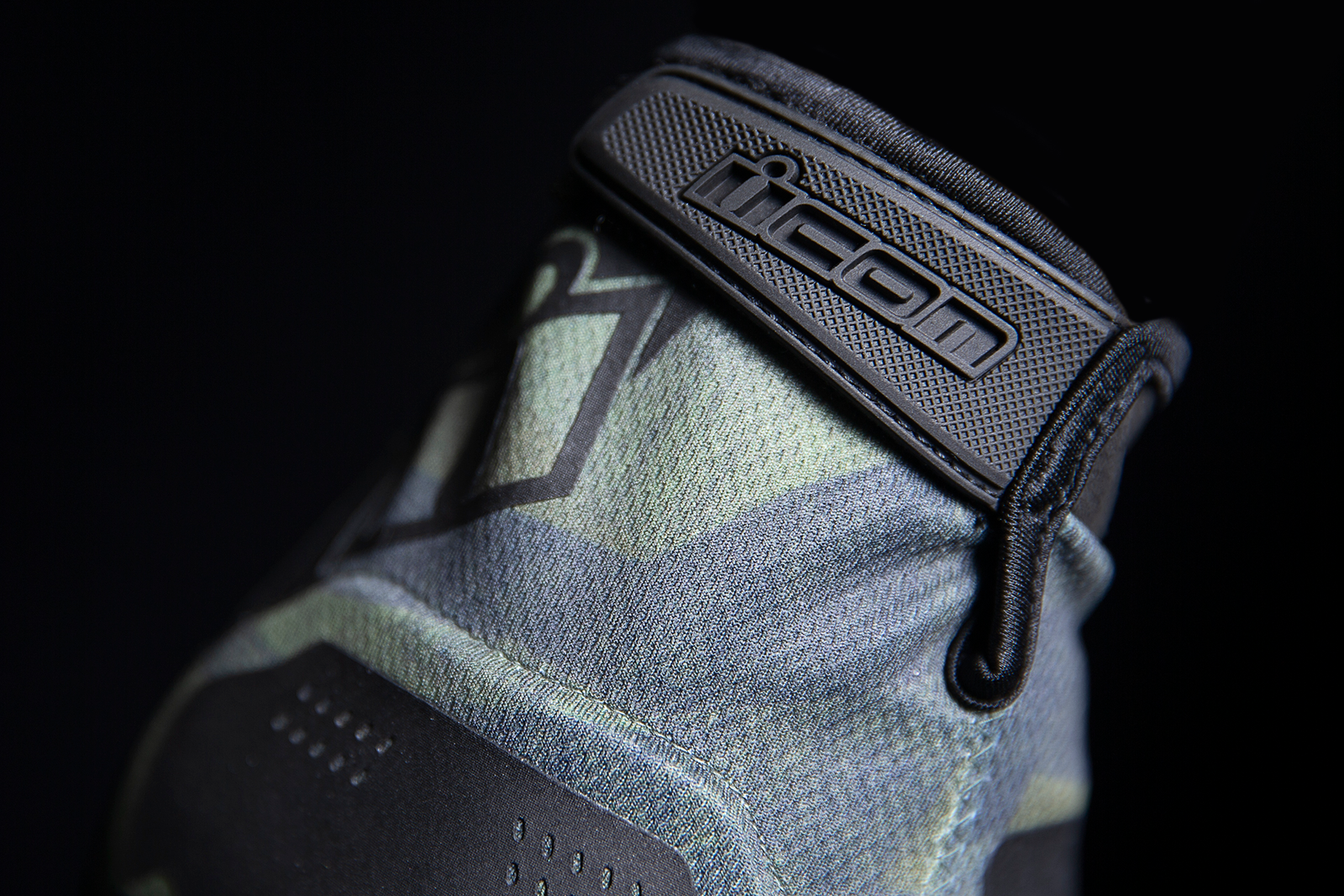 Green ICON Hooligan Battlescar Gloves in medium size, designed for motorcycle riding, with durable protective features and bold style.