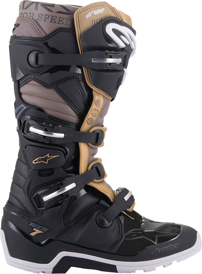 Alpinestars Tech 7 Enduro Drystar boots in black, gray, and gold with sturdy ankle support and rugged outsole, US size 9.