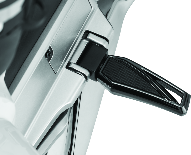 Black Kuryakyn Phantom Pegs without adapter for cruiser motorcycles, model 5761, shown mounted on motorcycle footrest.
