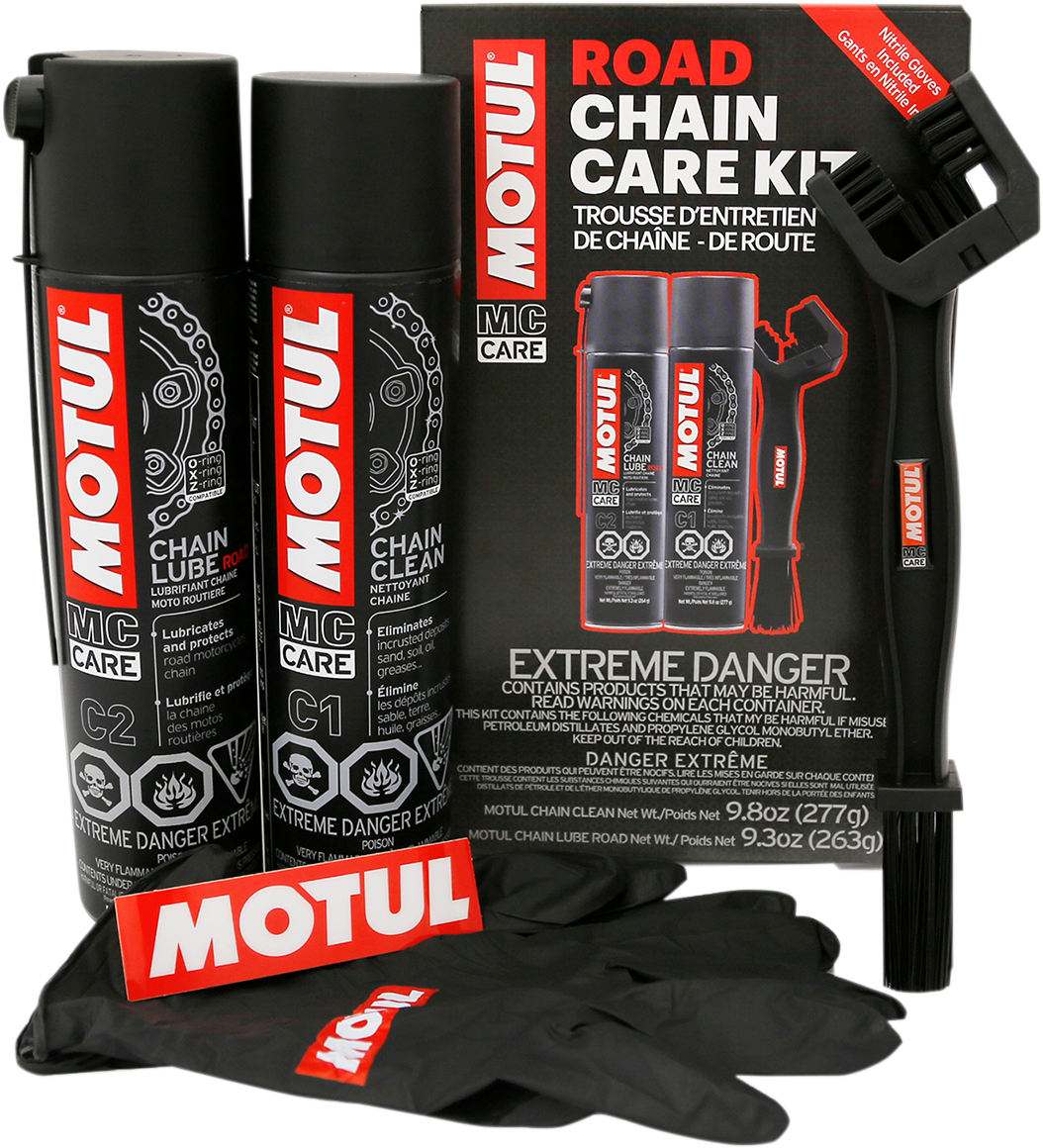 MOTUL Chain Care Kit for Road Use, includes chain cleaner and lubricant, displayed with tools and packaging in the image.