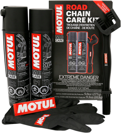 MOTUL Chain Care Kit for Road Use, includes chain cleaner and lubricant, displayed with tools and packaging in the image.