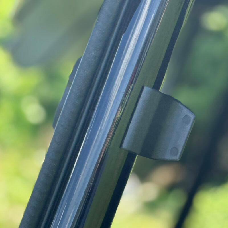 SEIZMIK UTV windshield made of hard-coated polycarbonate, tool-less installation, designed for durability and clear visibility.