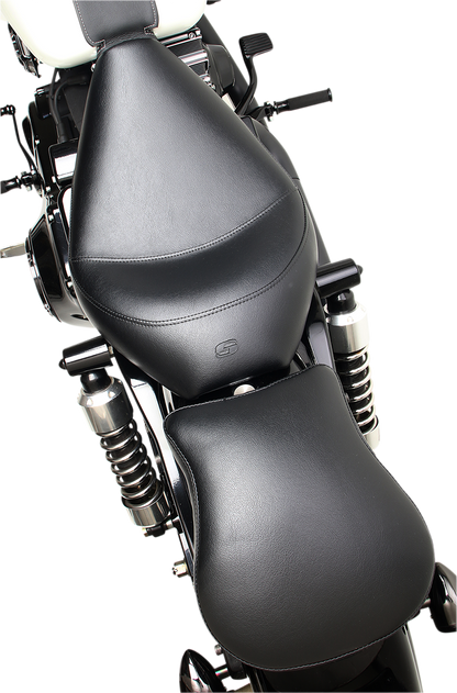 Contoured Saddlehyde S3 pad for seats by Saddlemens, shown in a close-up view highlighting its contoured design and saddle leather finish.