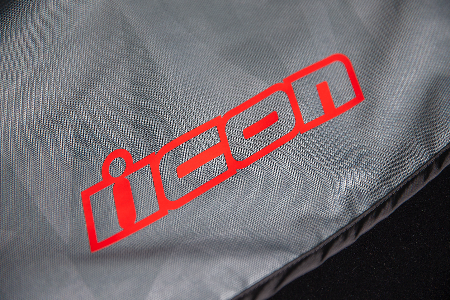 Gray ICON Airform Battlescar™ jacket by Bill's Exhausts, shown in small size, featuring a sleek, durable motorcycle jacket design.