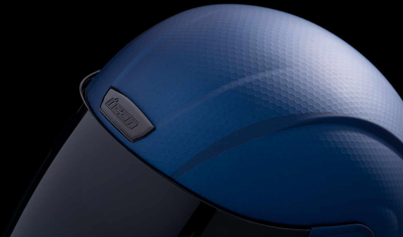 Blue ICON Airform™ Helmet with MIPS® technology, Counterstrike design in XL size, displayed from a front angle.