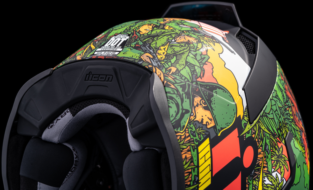 Green ICON Airflite™ helmet in size large, sporty motorcycle helmet with aerodynamic design and visor for riders.