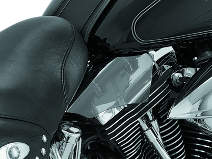 Kuryakyn Saddle Shields heat deflectors for Harley Davidson Softail motorcycle, 2000-2017, mounted on the bike's saddle area.