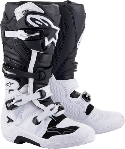 Alpinestars Tech 7 motocross boots in white and black, US size 10, with protective features and sturdy construction.