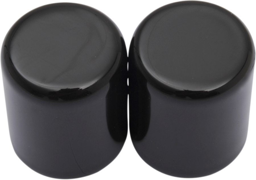 Small black docking covers for motorcycles by DRAG SPECIALTIES, shown in the image with a sleek, compact design.