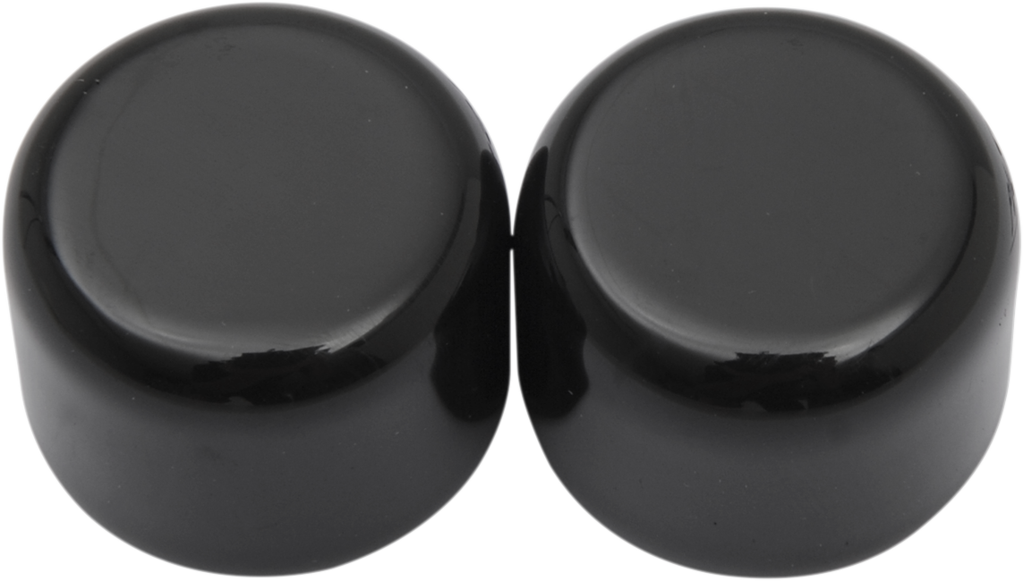 Short black DRAG SPECIALTIES docking covers C77-0100GB for motorcycle, shown in a close-up image.