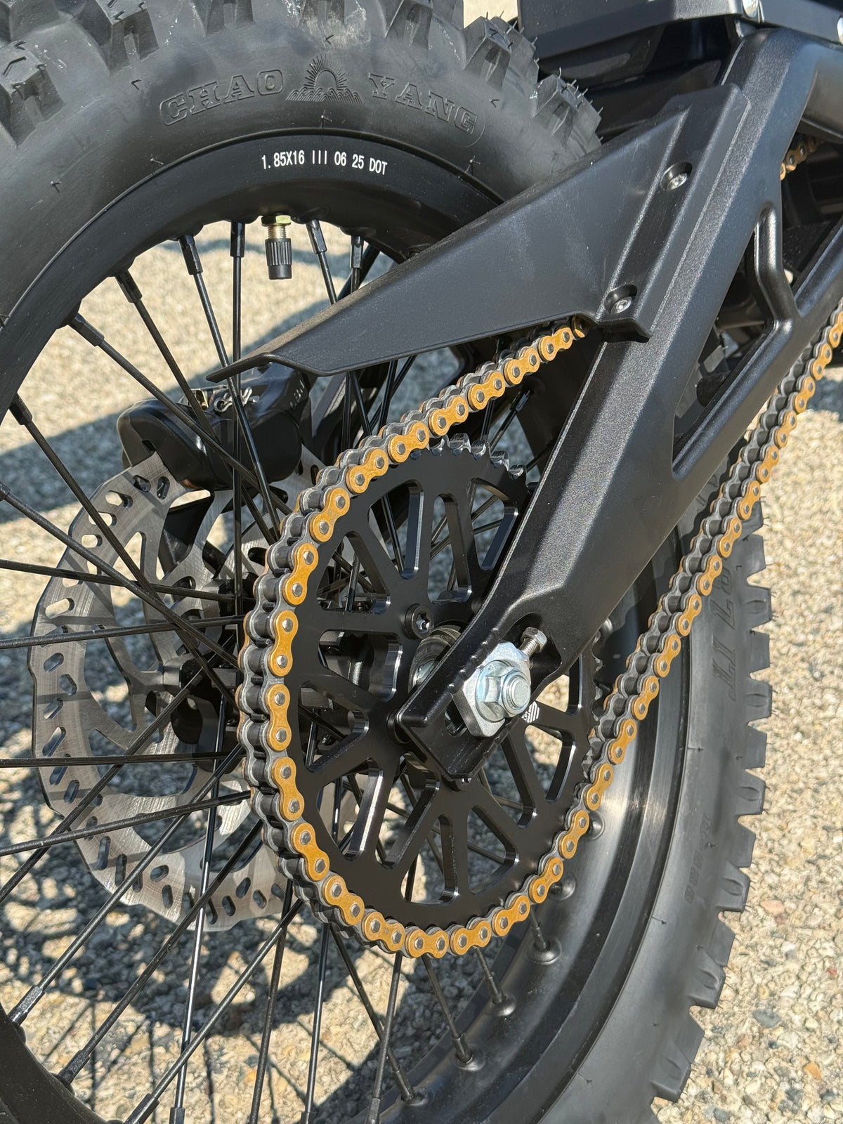 E Ride Pro SR electric dirt bike with 25KW motor, black frame, knobby tires, and sleek design for off-road riding.