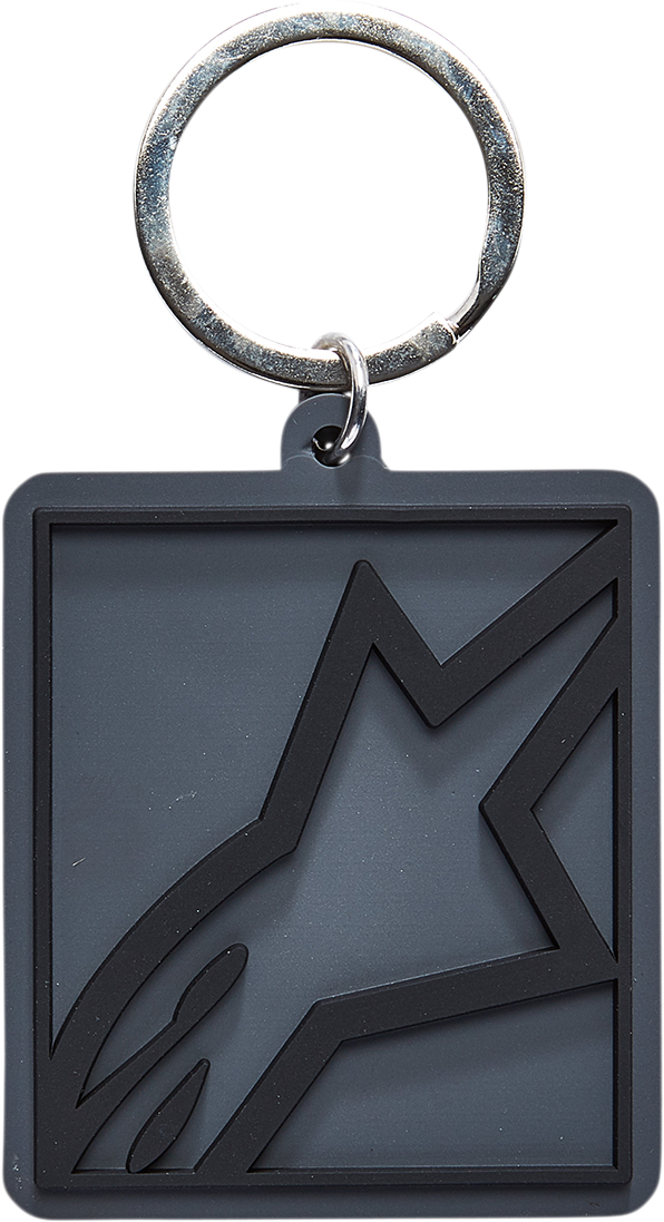 Alpinestars key fob featuring the Corp Shift design, with protective gear branding, shown on a white background.