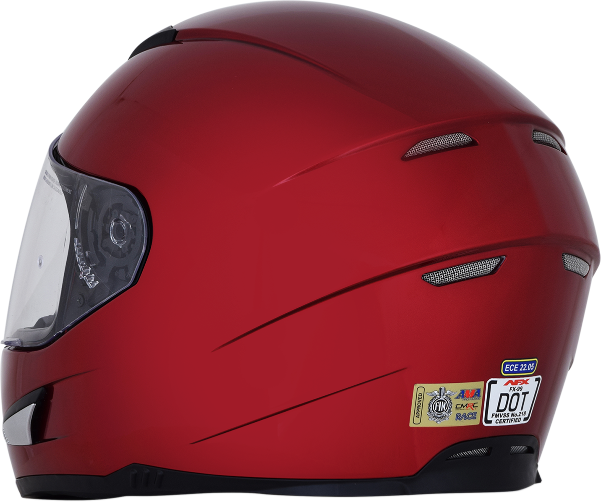 Wine red AFX FX-99 helmet in XS size featuring a sleek, aerodynamic design with secure strap and venting for motorcycle riding.