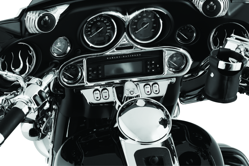 Kuryakyn Stereo Accent in chrome for 1996-2013 Harley-Davidson FL Touring models, showcasing the sleek, shiny motorcycle accessory.