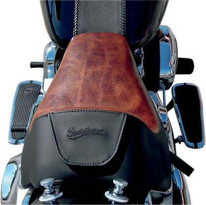 Bill's Exhausts SADDLEMEN Lariat Seat for FLSTN/C motorcycle, featuring sleek black design and comfortable seating.