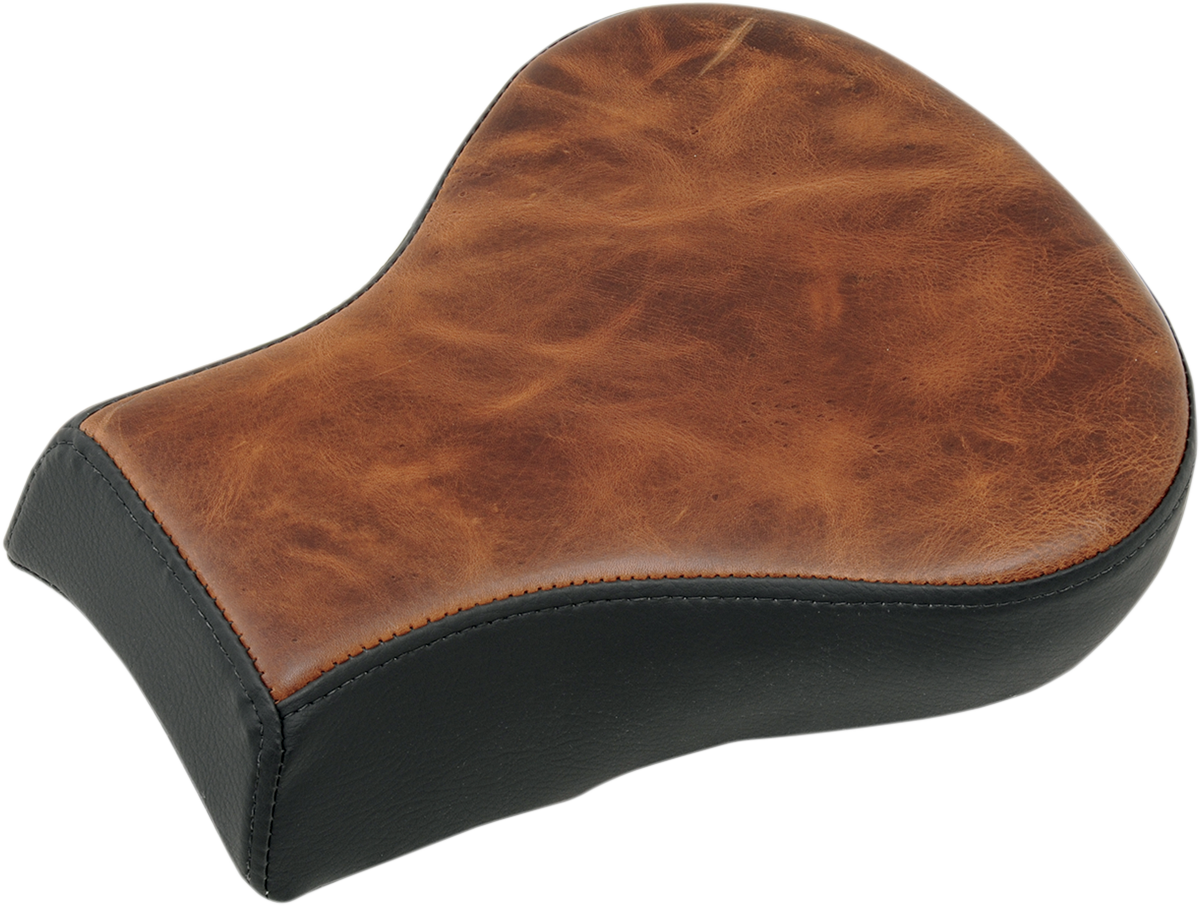 Brown Saddlemens Pillion Pad Lariat seat for motorcycle, designed for comfort and style, with visible stitching and padding.