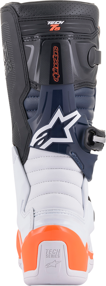 Alpinestars Youth Tech 7S motocross boots in black, orange, and white with protective features and adjustable straps.
