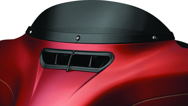 Kuryakyn Smooth Windshield Trim for Harley Davidson Touring Models, close-up of chrome motorcycle windshield accessory.