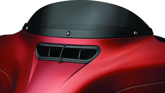 Kuryakyn Smooth Windshield Trim for Harley Davidson Touring Models, close-up of chrome motorcycle windshield accessory.