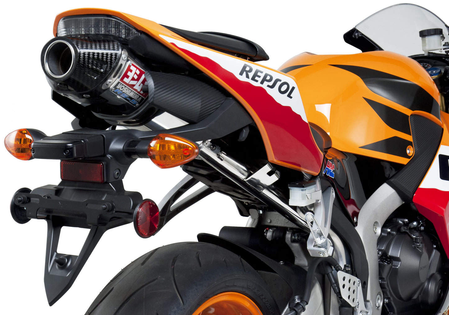 YOSHIMURA RS-5 Slip-On SS stainless steel and carbon fiber exhaust for UTVs, featuring polished finish and compact design