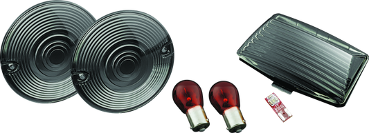 Kuryakyn rear smoke lens kit for Harley Davidson motorcycles, showcasing the tinted LED lens and mounting hardware.