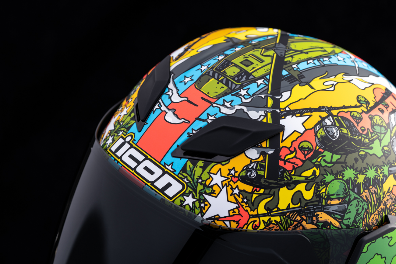 Green ICON Airflite™ GP23 helmet in small size, featuring a sleek aerodynamic design and bold graphics.