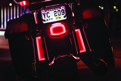 Kuryakyn Tracer LED Inserts for Harley Davidson saddlebag supports, chrome with red auxiliary lighting for touring models