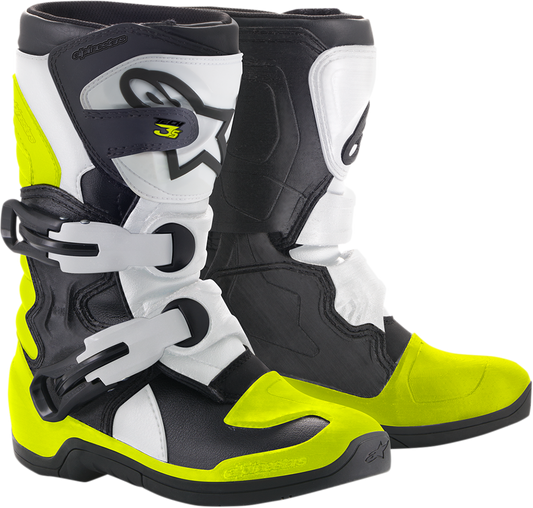 Black, white, and yellow Alpinestars Youth Tech 3S motorcycle boots with protective features and adjustable straps.